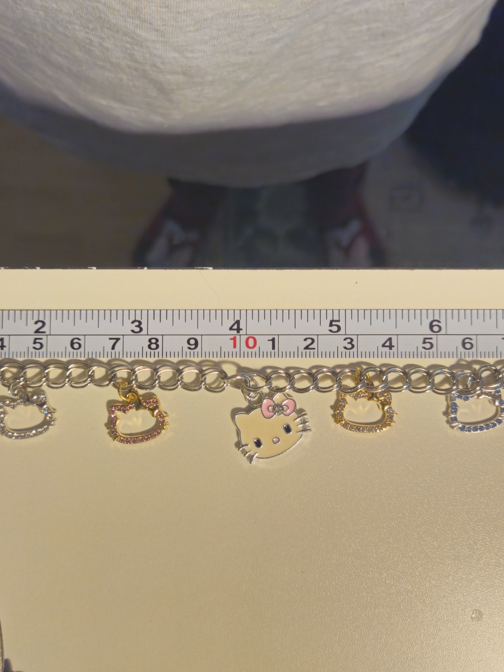 Hello Kitty Gold-Tone Charm Bracelet.
